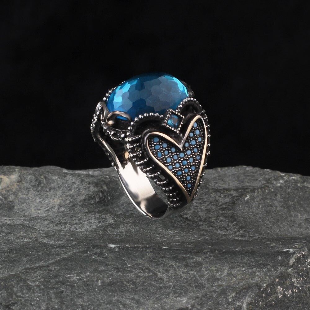 خاتم فضة مع حجر الزركون بلون أزرق - 1