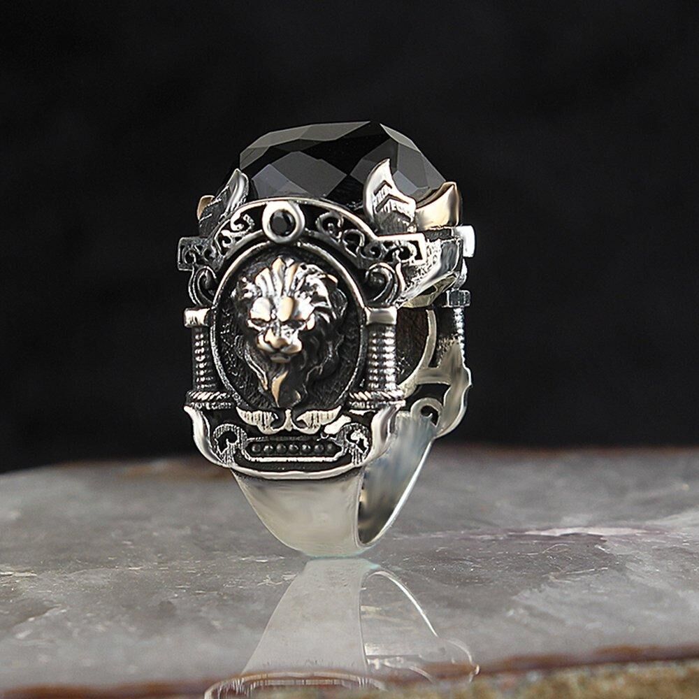 Men's silver ring with a lion head design