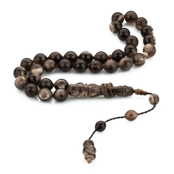 Buffalo horn rosary with a starling cut design - 1