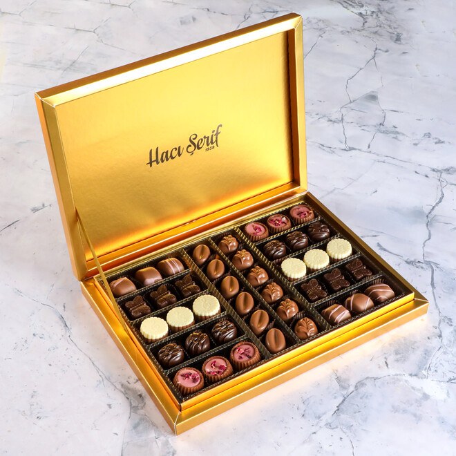 Luxurious chocolate pieces , golden box - 1
