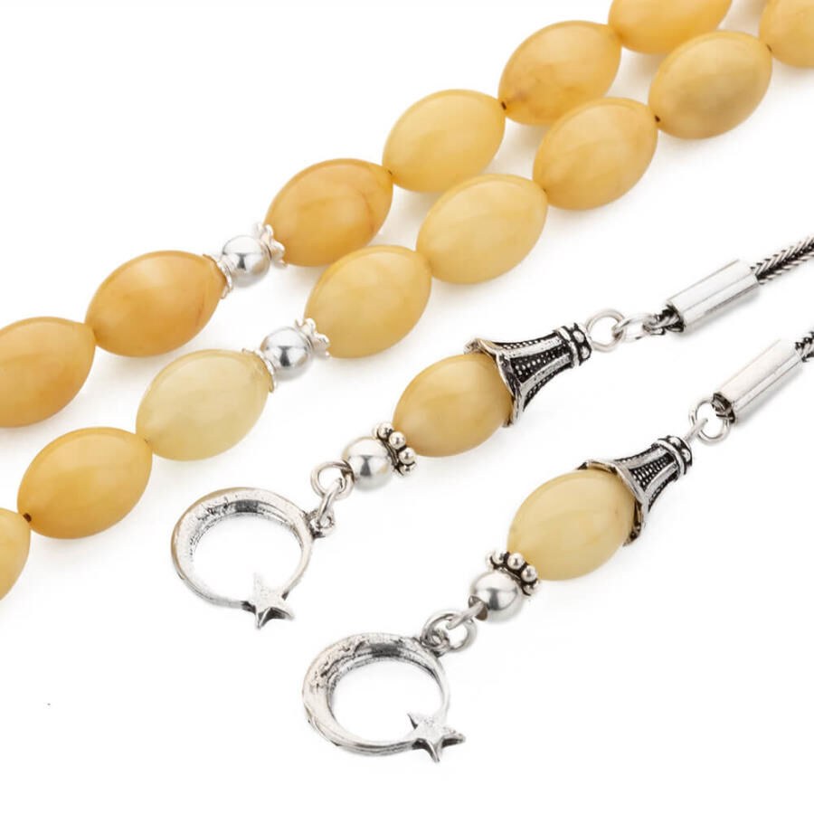 Rosary made of amber drops with a moon star symbol decorated tassel - 1