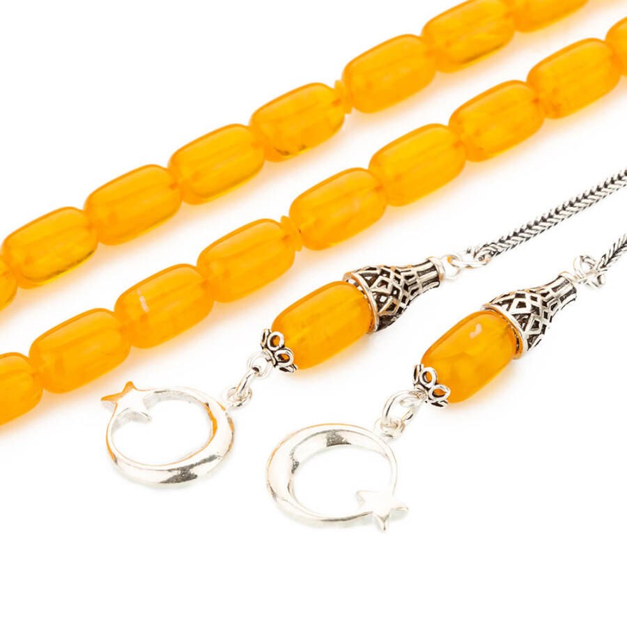 Rosary made of pressed amber with double tassel bearing a moon star symbol - 3